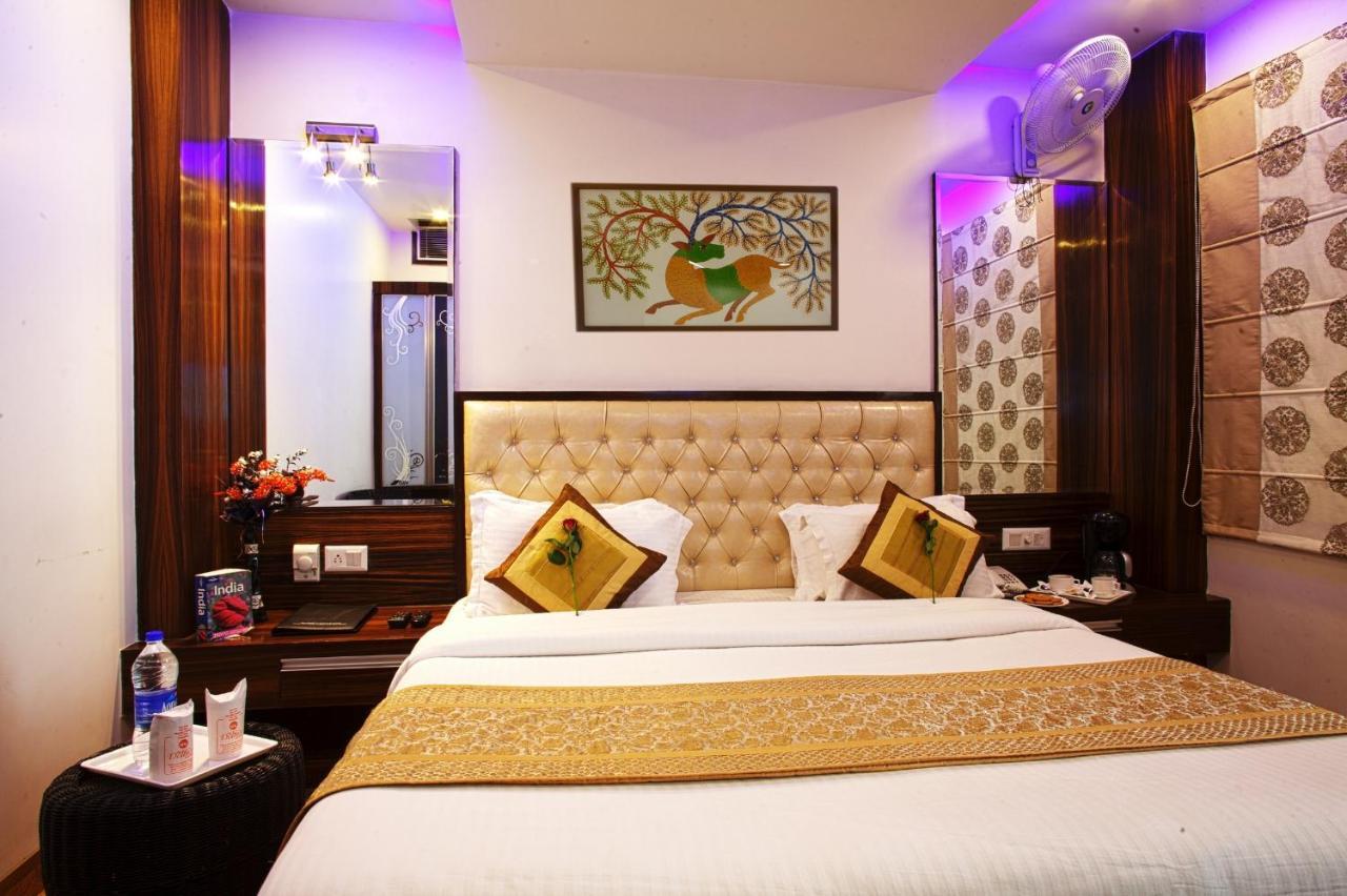 Hotel Delhi 55 -City Center New Delhi Phòng bức ảnh