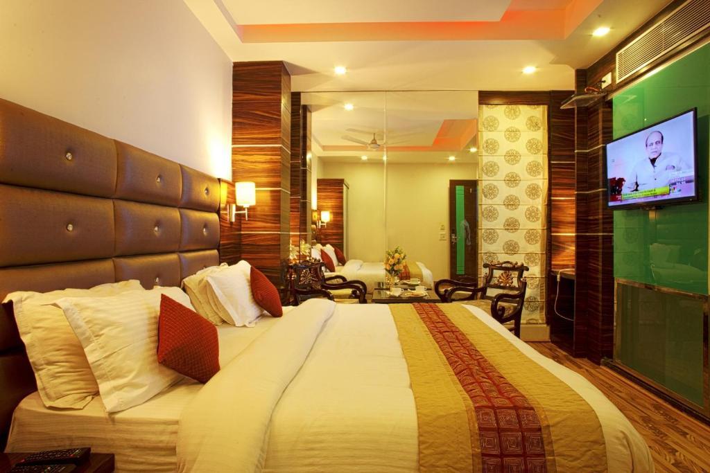 Hotel Delhi 55 -City Center New Delhi Phòng bức ảnh